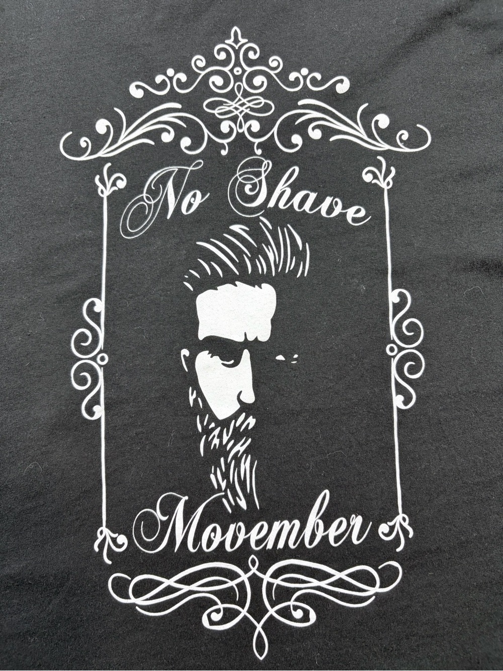 District Black Tee with White 'No Shave Movember' Graphic